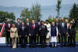 G7 leaders standing together for an official group photograph at the summit.