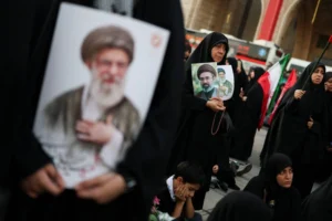 Iran's political and military leadership attends the state funeral amid heightened regional tensions.
